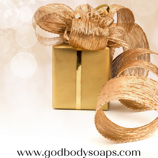 gift card photo of gold gift box with gold ribbon. text says www.godbodysoaps.com